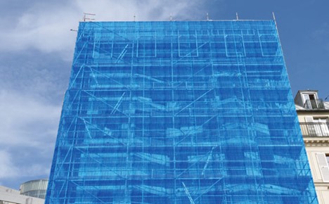 Scaffolding mesh on building
