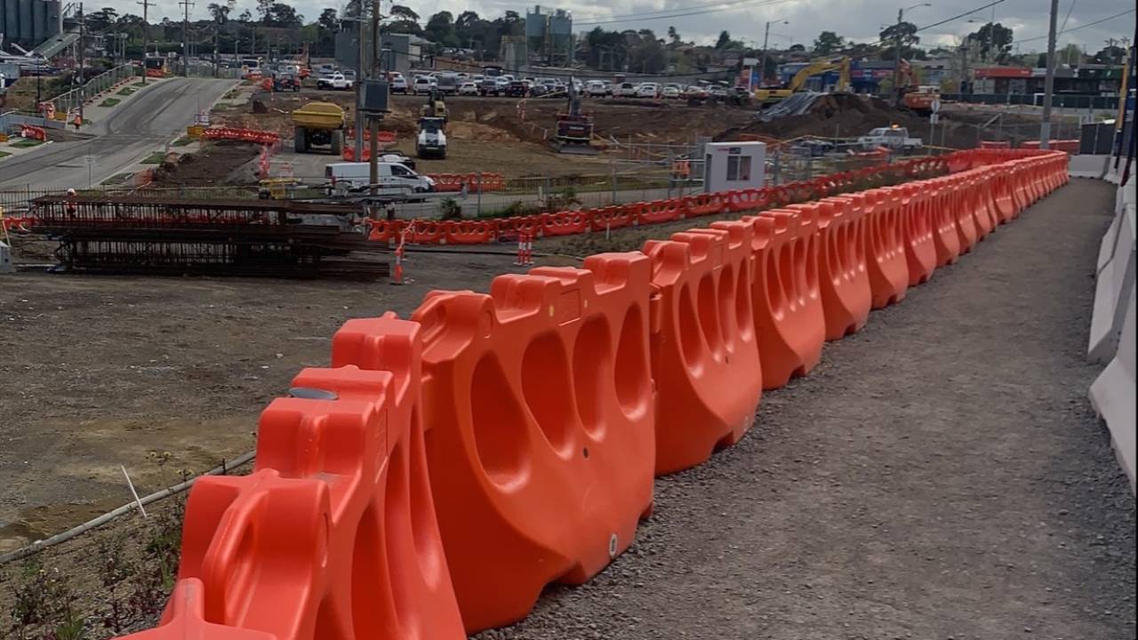 Orange crowd control barriers
